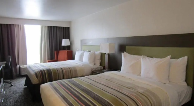 Четырёхместный номер Standard Country Inn & Suites by Radisson, New Orleans I-10 East, LA