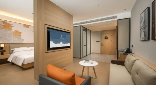 Люкс Yilong Ruiyun Hotel (Xinyang Railway Station Tianrun Square Branch)