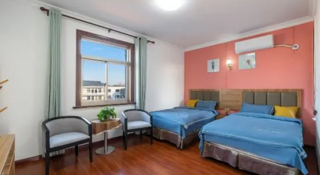 Кровать в общем номере Shanghai Gujia Homestay