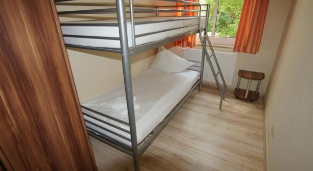 Апартаменты Ferienwohnung 4 Rosenbogen - Familienwohnung mit Wintergarten und Terrasse