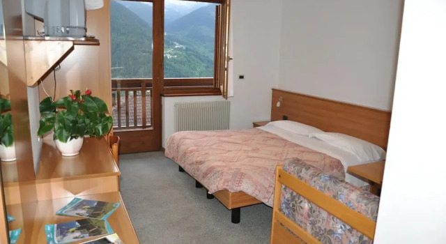 Четырёхместный семейный номер Standard с балконом Albergo Dolomiti