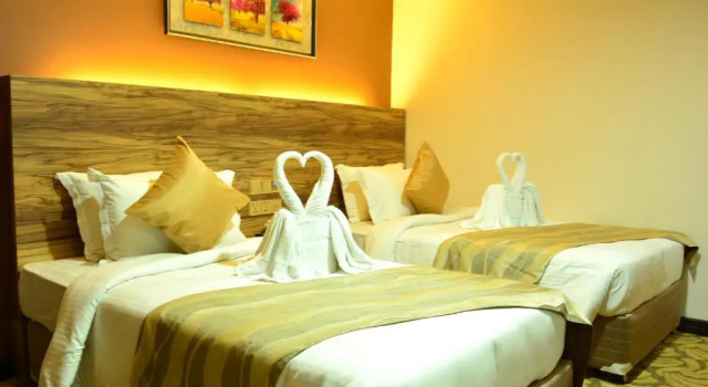 Четырёхместный номер Deluxe Pearl City Hotel