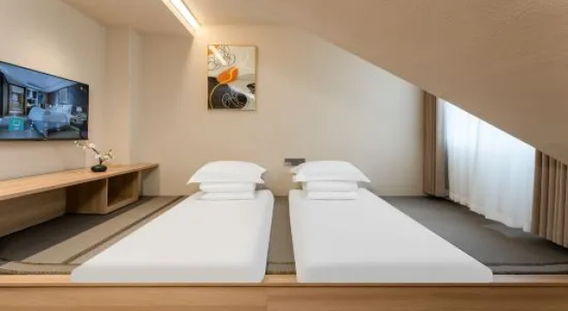 Апартаменты Qingdao Changwan Hotel
