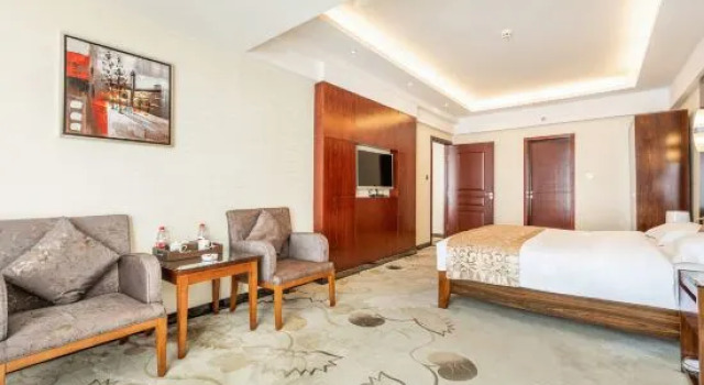 Люкс Deluxe Xiahe Jiusheng international Hotel