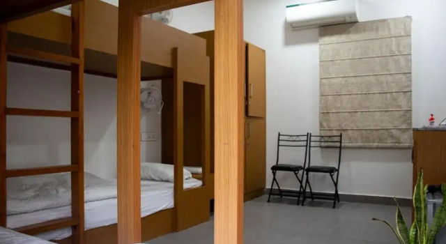 Кровать в общем номере Stay Banaras - A Boutique Hotel in Sigra