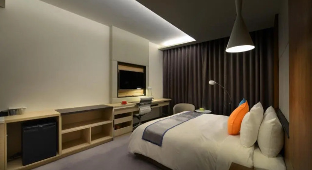 Четырёхместный номер Deluxe Golden Tulip Glory Fine Hotel