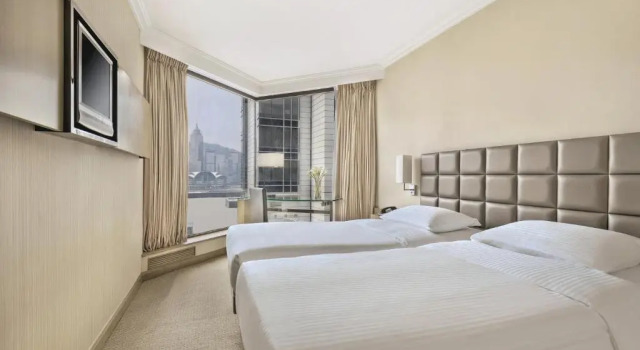 Двухместный номер с частичным видом на гавань The Kowloon Hotel