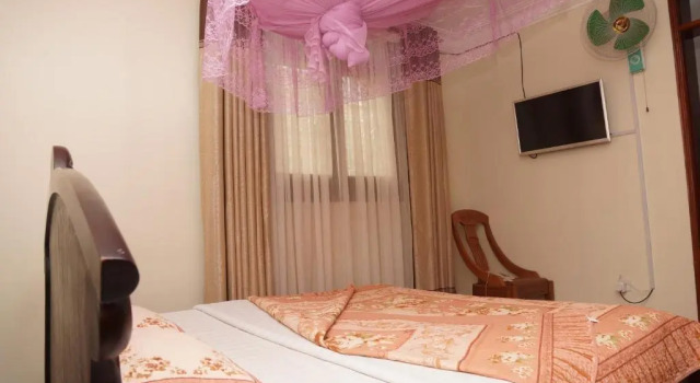 Habitación Económica Cosmil Executive Suites