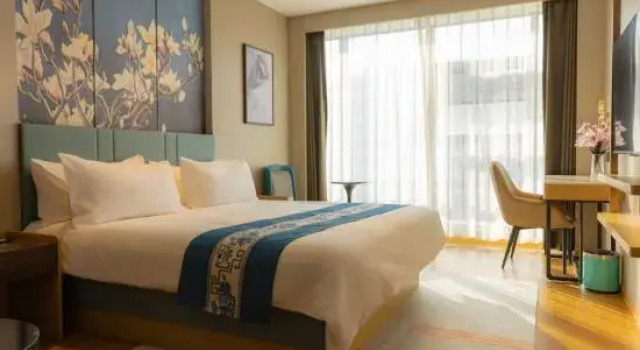 Люкс Deluxe Magnotel Hotel (Wuhan Changfu Industrial Park People's Auto City)
