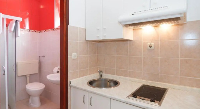 Студия Apartments & Rooms Konoba Tomić