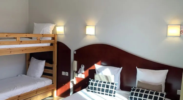 Трёхместный номер Hotel les Commercants