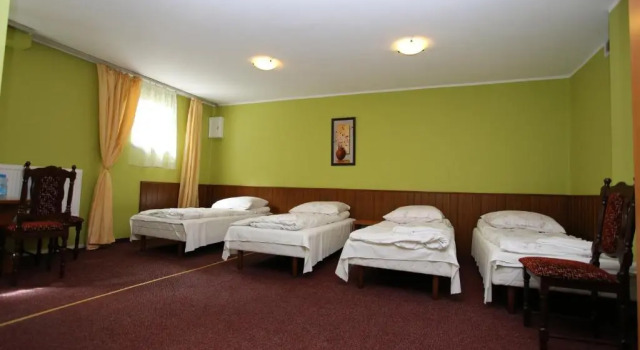 Кровать в общем номере Hotel Kakadu