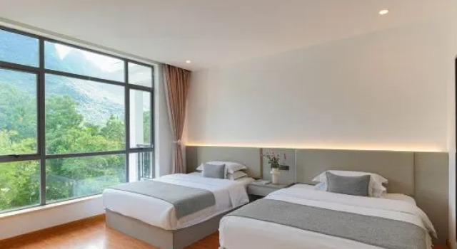 Семейный люкс c 1 комнатой с балконом Yueshanyueshui Vacation Apartment (Yangshuo Yulong River Xiatang Wharf)