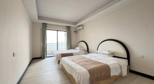 Люкс с 3 комнатами с балконом и с видом на море Shili Yintan Haizhiyun Seaview Apartment