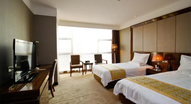 Люкс Deluxe GreenTree Eastern Yancheng Binhai Oubaoliya City Square Hotel