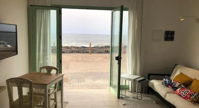 Апартаменты Цокольный этаж CASA ANCLADA en LA SANTA- 4 Apartamentos frente al mar- 1ª linea solarium