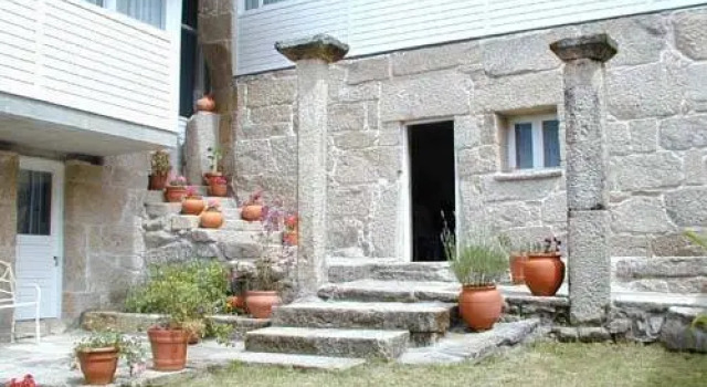 Кровать в общем номере Casa Rural O'Pozo