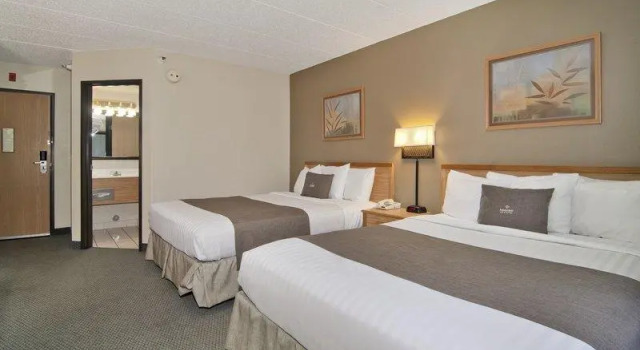 Кровать в общем номере Boarders Inn & Suites by Cobblestone Hotels - Faribault
