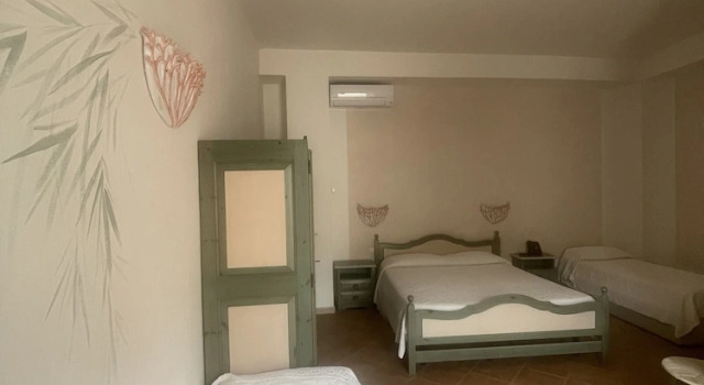 Четырёхместный номер Comfort Hotel Micalosu