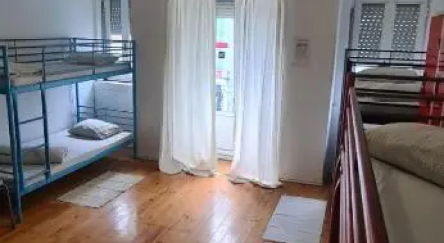 Кровать в общем номере Auristelas Hostel