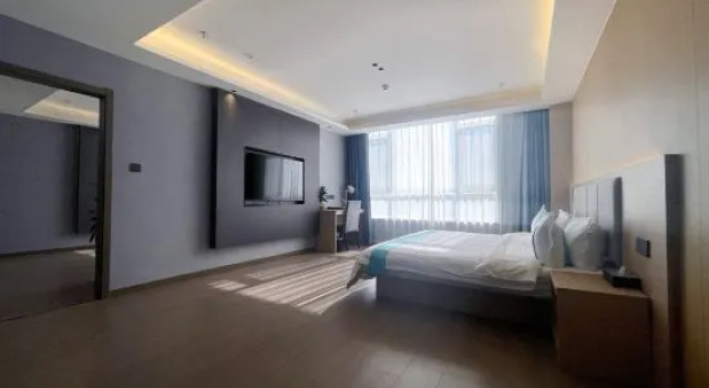 Семейный люкс Deluxe Qingdao Longfu Xiyan Hotel