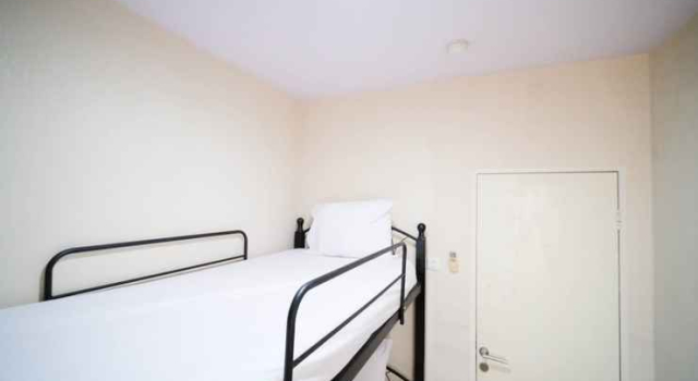 Homey and Best Location 2BR at Twin Tower Apartment By Travelio