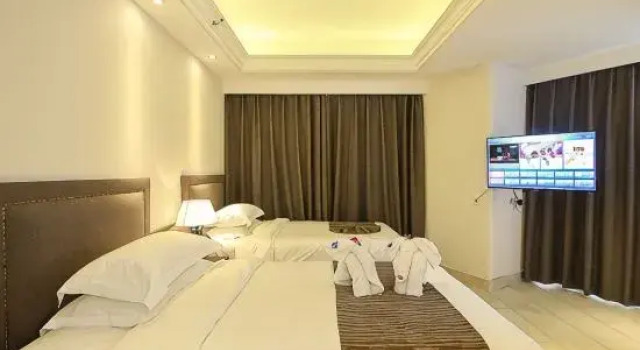 Люкс Deluxe Tianyi International Hotel (Nandujiang Meilan Airport Branch)