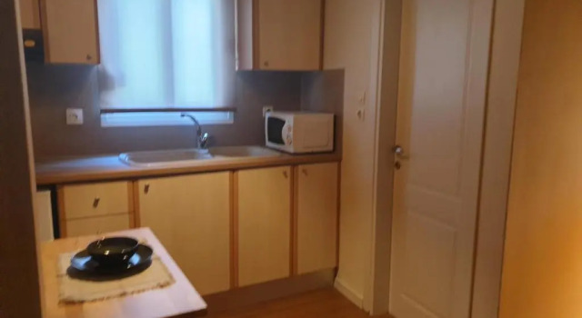 Апартаменты A pleasent small -studio close to the port of Volos