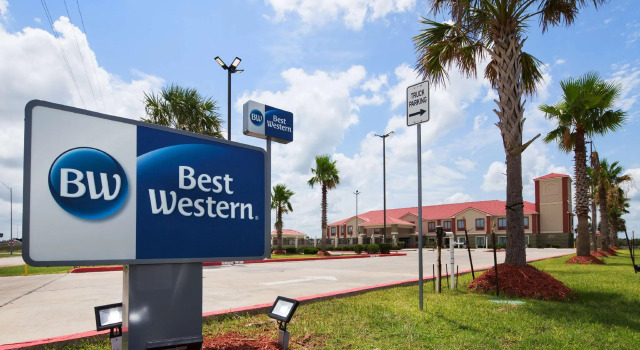 Кровать в общем номере Best Western Lone Star Inn