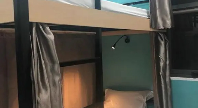 Кровать в общем номере Peaceful House Hostel