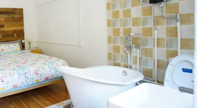 Коттедж с 4 комнатами Snail Home Inn