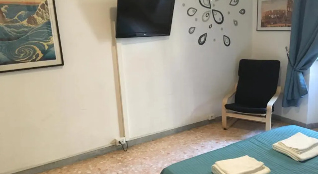 Апартаменты Delightful apartment 100 meters from the Colosseum