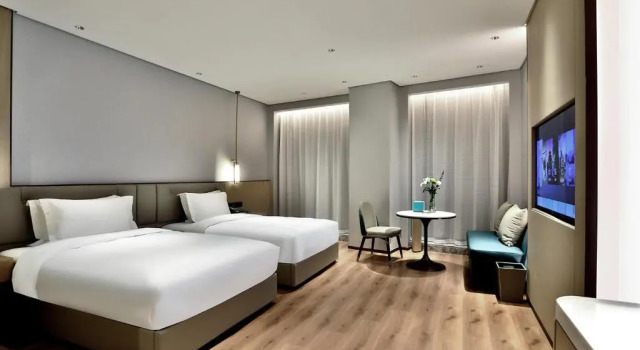 Четырёхместный номер Deluxe Wyndham Garden Hangzhou Yuhang