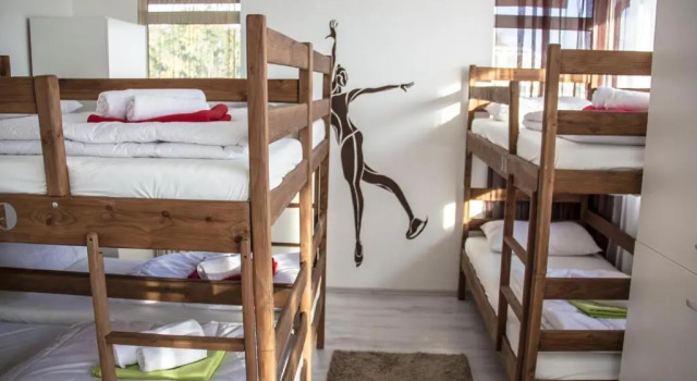 Кровать в общем номере Hostel Poolside