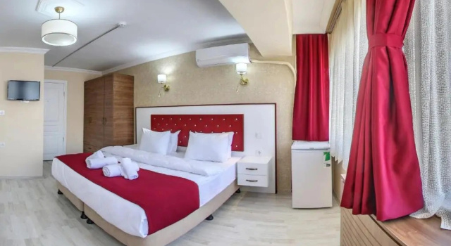 Четырёхместный люкс Family Cihangir Palace Hotel