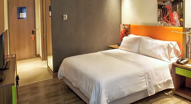 Standard quadruple chambre Hampton by Hilton Cali