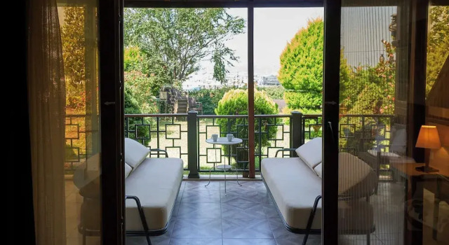 Luxo quarto varanda Phellos Suites
