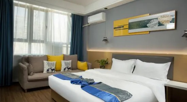 Полулюкс Deluxe Xinkaicheng Business Hotel (Four Seasons City )