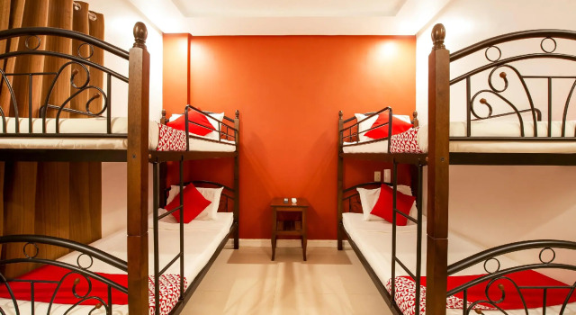 Кровать в общем номере Royale Parc Hotel Puerto Princesa Palawan