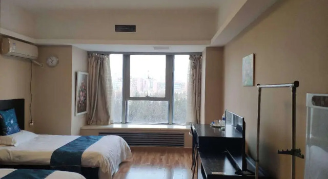 Четырёхместный номер Standard Tiandi Huadian Apartment Boya