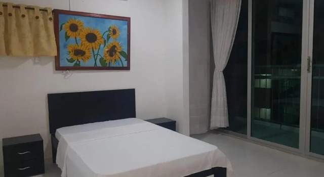 Кровать в общем номере SGH Rodadero Suites