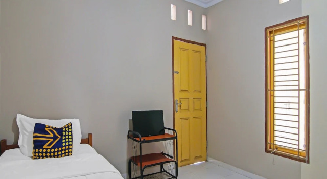 Номер Economy Hotel O Flamboyan 25 Homestay Syariah