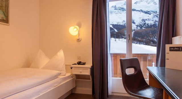Одноместный номер Standard с балконом и с видом на горы Hotel THE LARIX ski-in ski-out