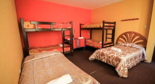 Cama en dormitorio compartido Rumi Wasi