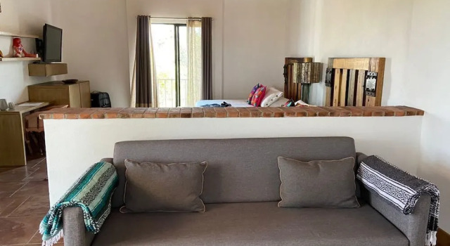 Четырёхместный номер Standard с балконом и с видом на сад Quiote Guest House by Homelyrooms