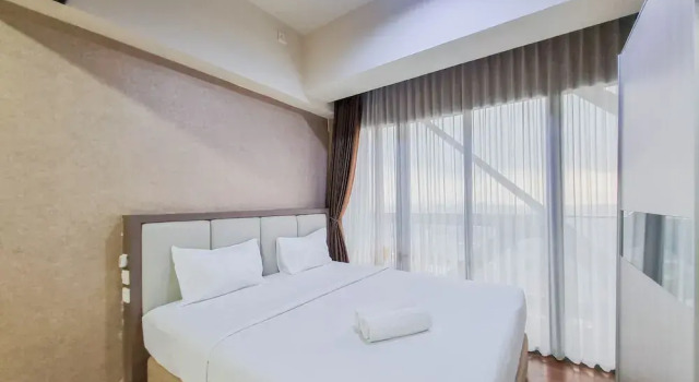 Апартаменты Standard Cozy Studio Room at Uttara The Icon Apartment By Travelio