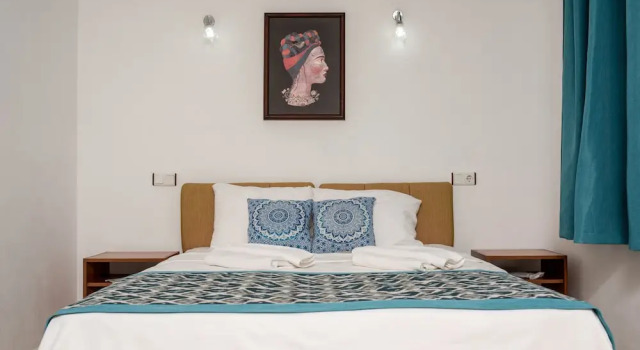 Трёхместный семейный номер Standard с балконом и с видом на сад San Simon Hotel