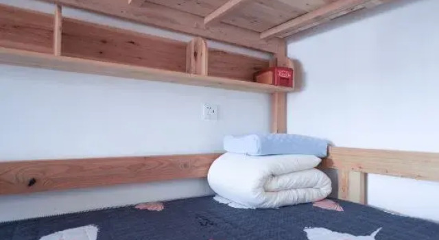 Кровать в общем номере Xingyi Yiyi Youth Hostel