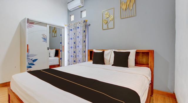 Номер Deluxe OYO 94851 Watulumpang 1 Guest House