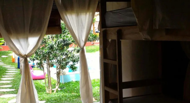 Кровать в общем номере Balicabana Bungalows